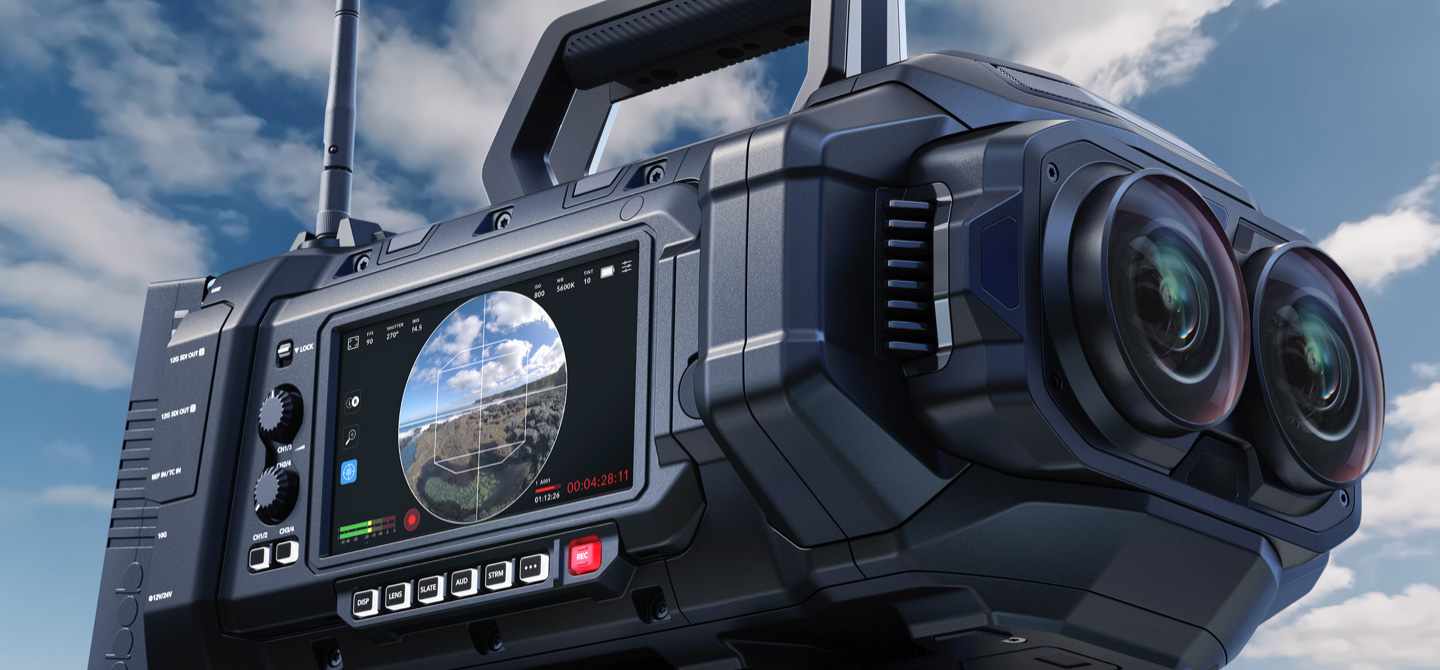 Blackmagic URSA Cine Immersive camera photographed from a low angle with its dual stereoscopic lenses against the sky