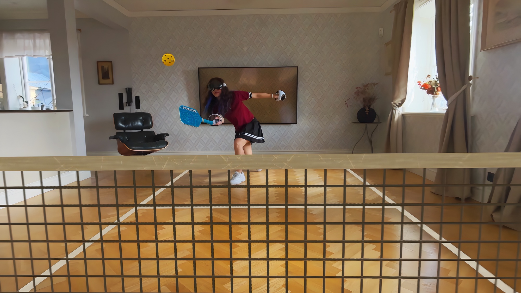 A Pickle Pro player wearing Apple Vision Pro and swinging a virtual paddle on a mixed reality pickleball court