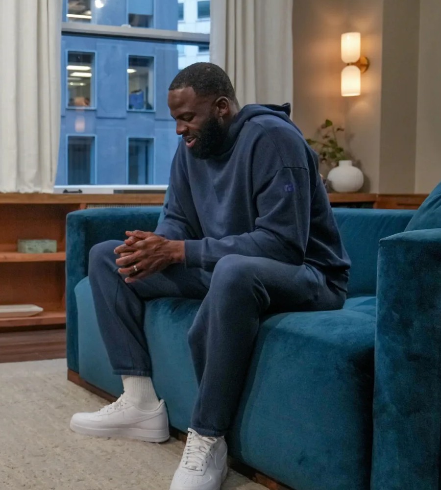 Draymond Green seated during an Open Season therapy session