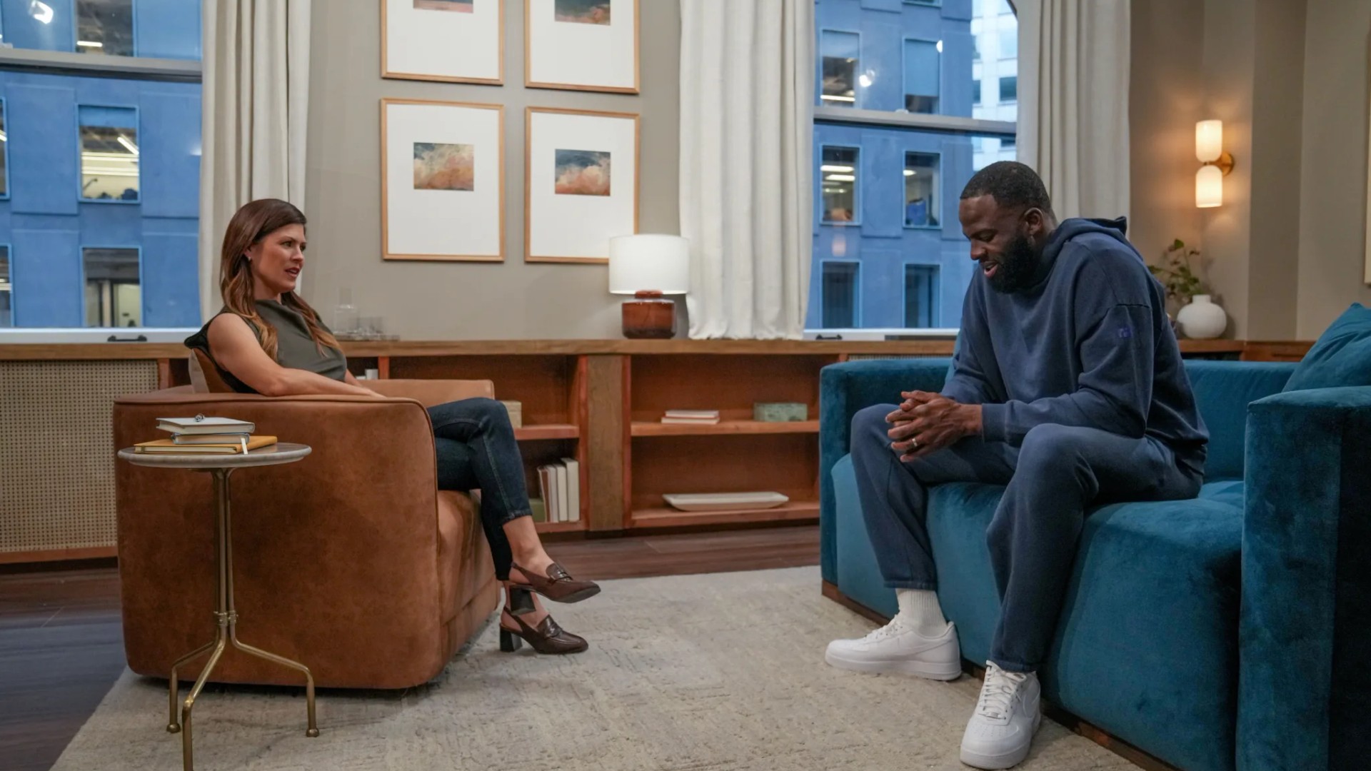 Dr. Carrie Hastings and Draymond Green seated across from each other in a therapy session