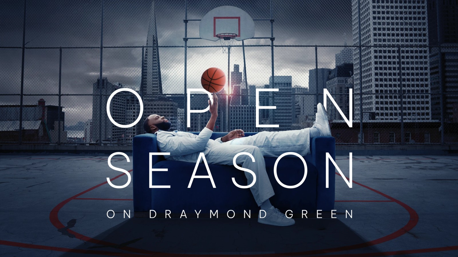 Official Open Season artwork showing Draymond Green reclining on a couch on a basketball court