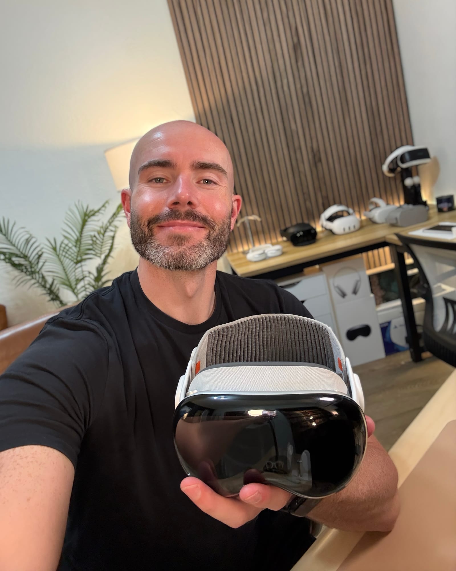 Justin Ryan holding Apple Vision Pro after a hands-on session