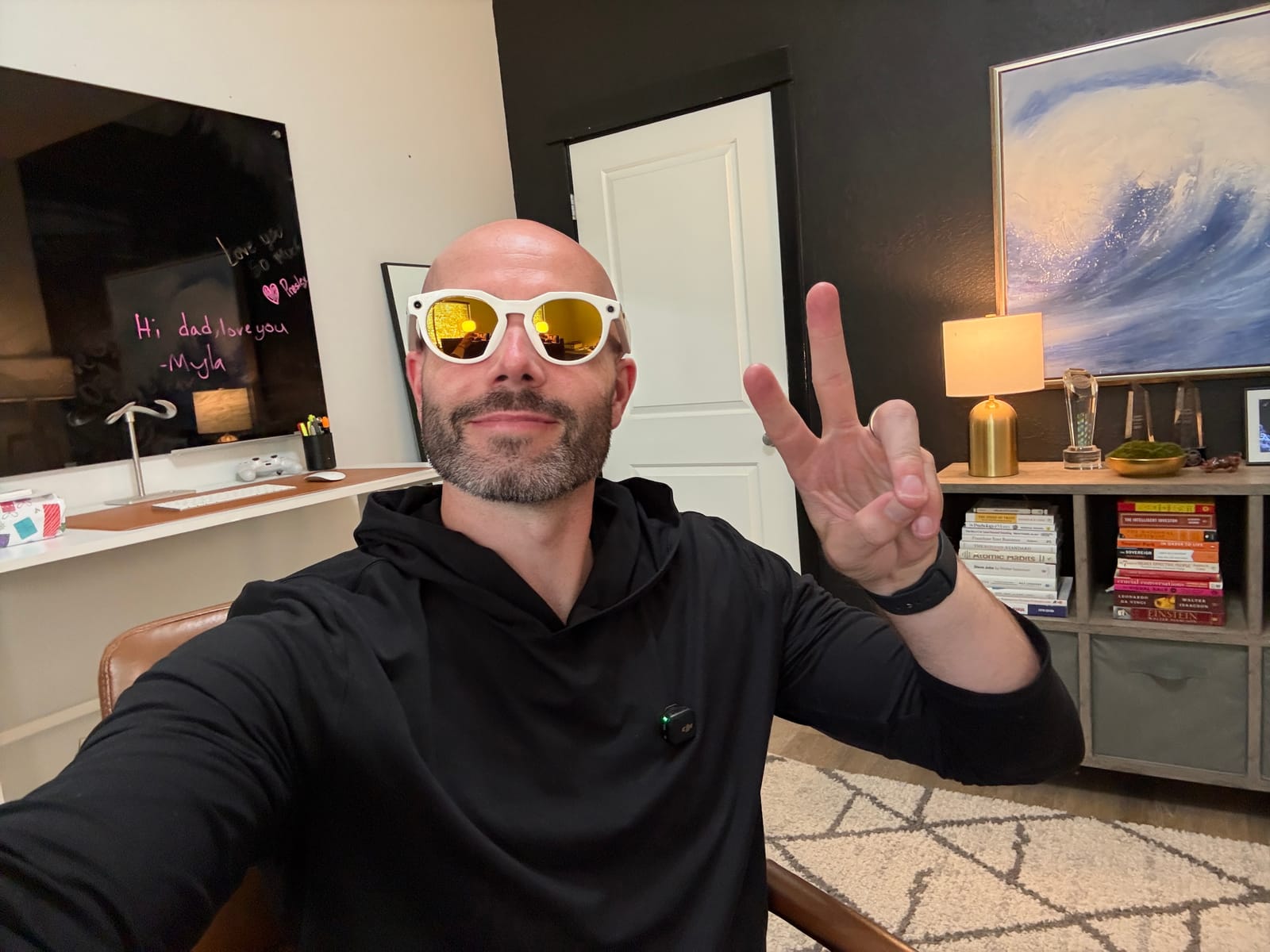 Justin Ryan trying smart glasses in his studio