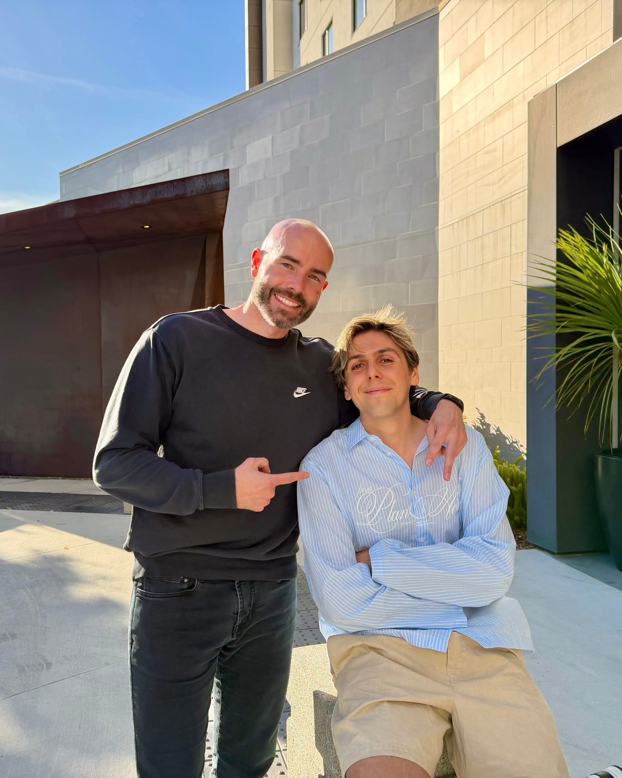 Justin Ryan with a guest outdoors