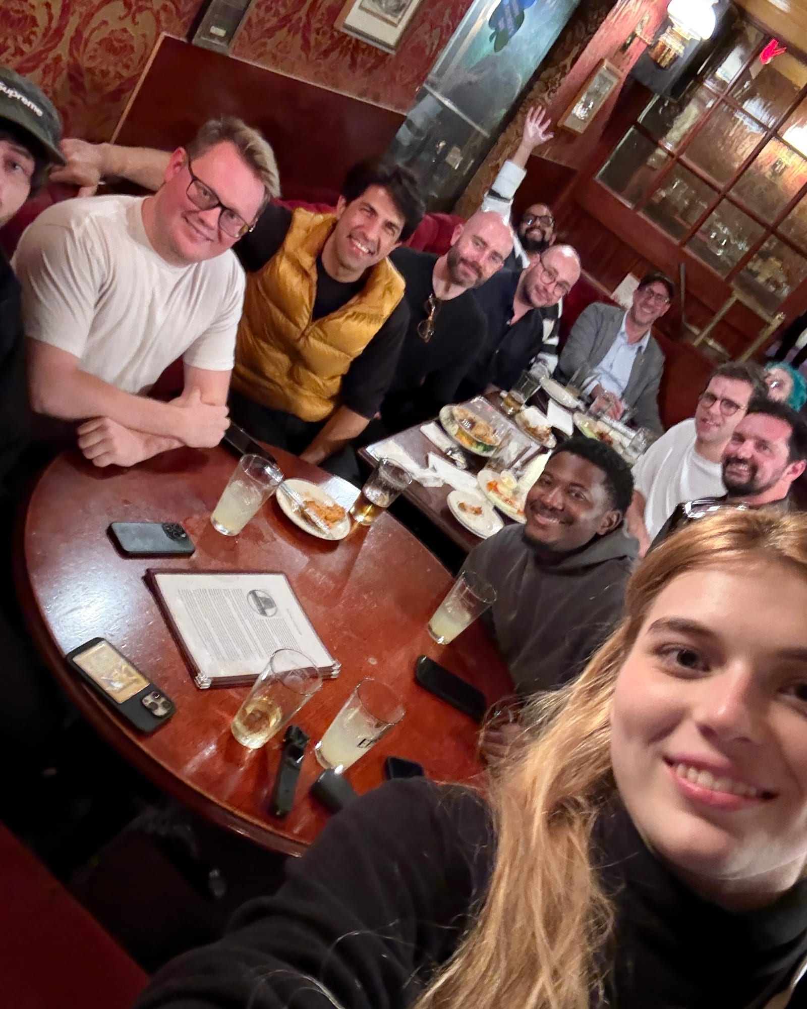 A group of spatial technology creators and guests gathered at a restaurant
