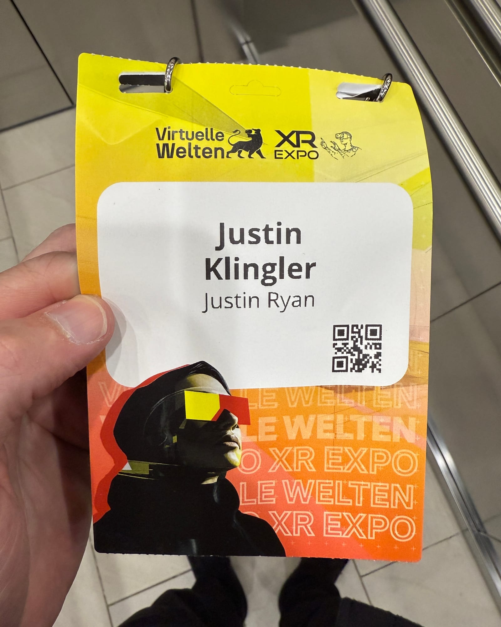 A Virtuelle Welten XR Expo attendee badge for Justin Ryan