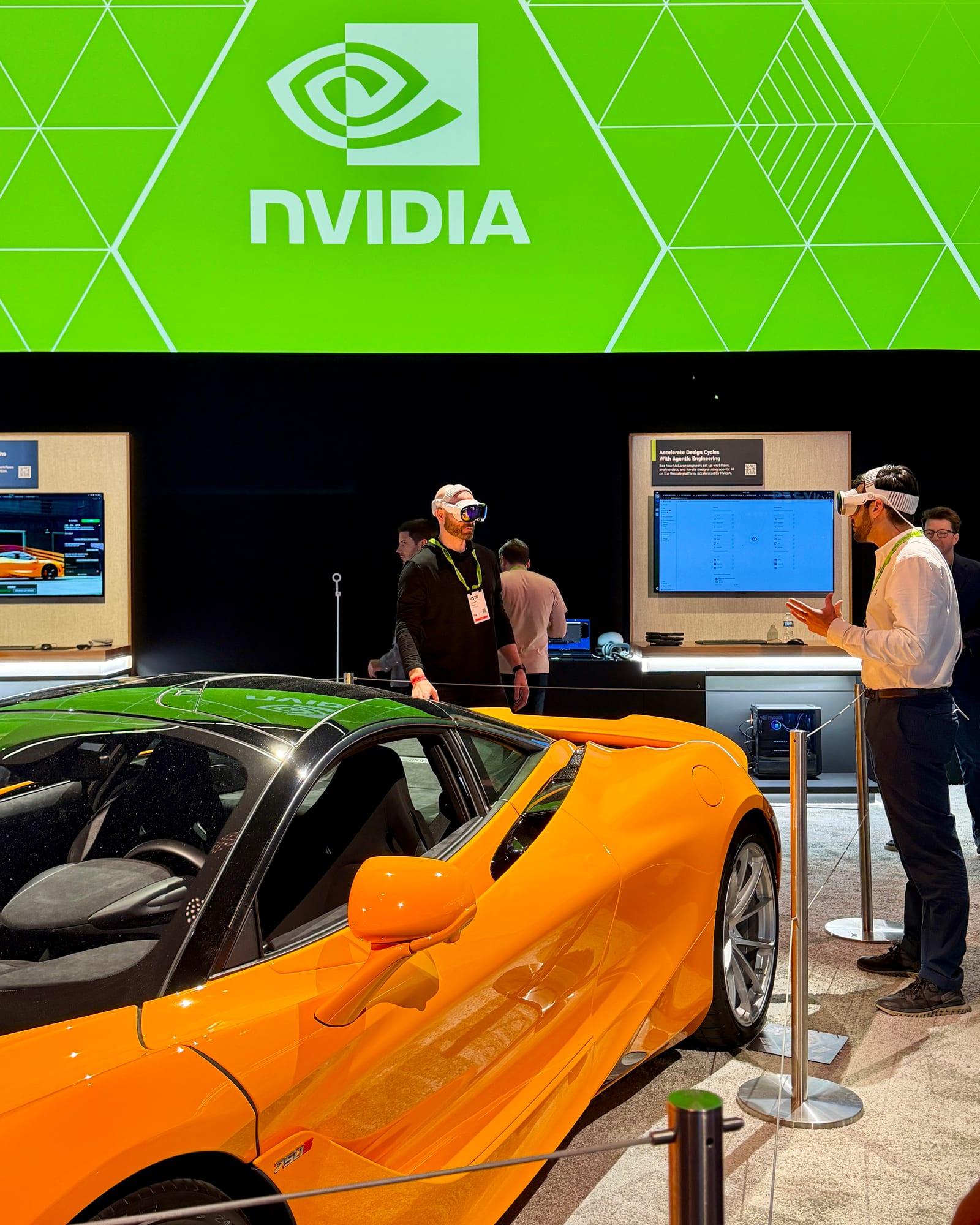 An NVIDIA spatial computing demonstration with an orange sports car