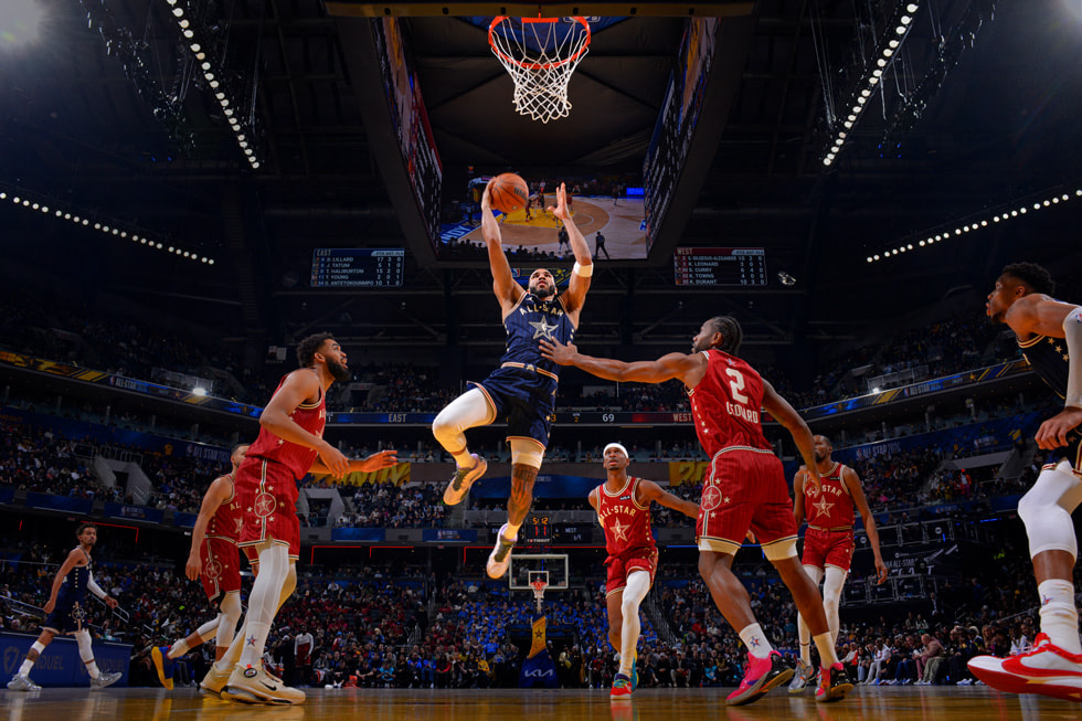 Basketball players on court during 2024 NBA All-Star Weekend