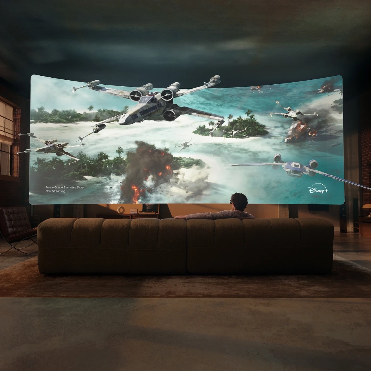 Disney+ promotional visualization of Rogue One playing on a large virtual screen in front of a sofa.