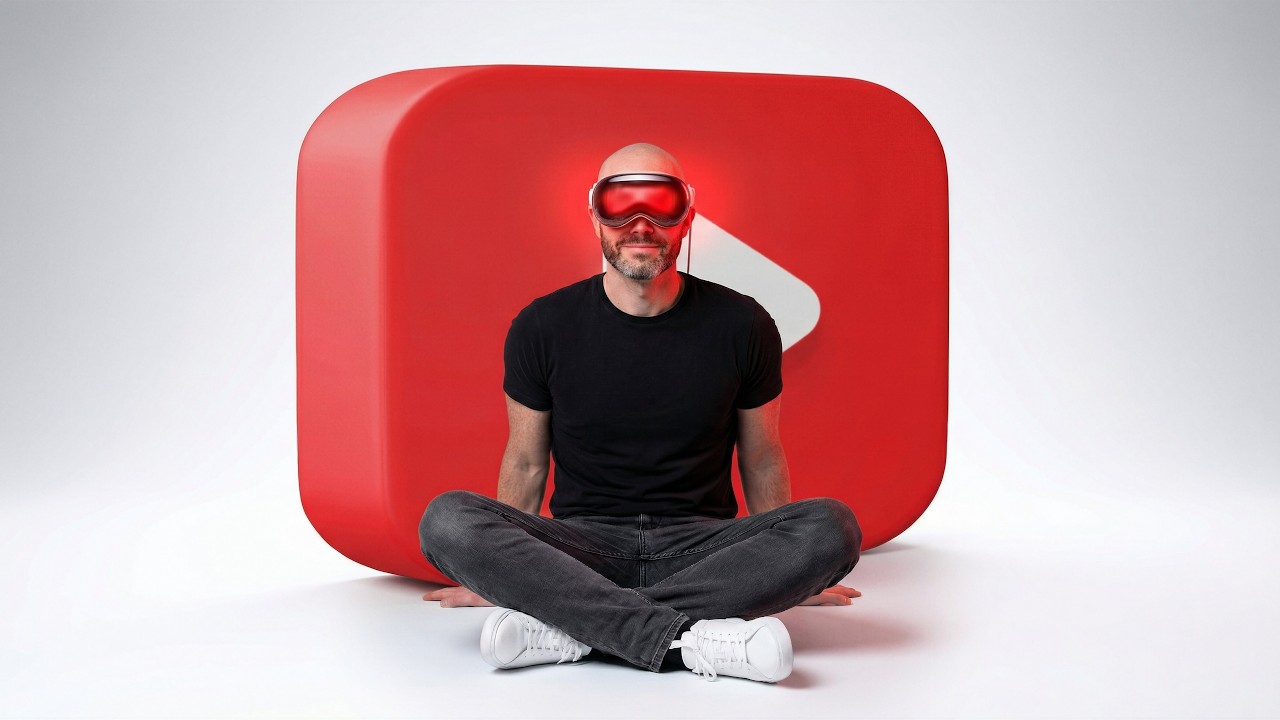 Justin seated in front of a large YouTube icon while wearing Apple Vision Pro