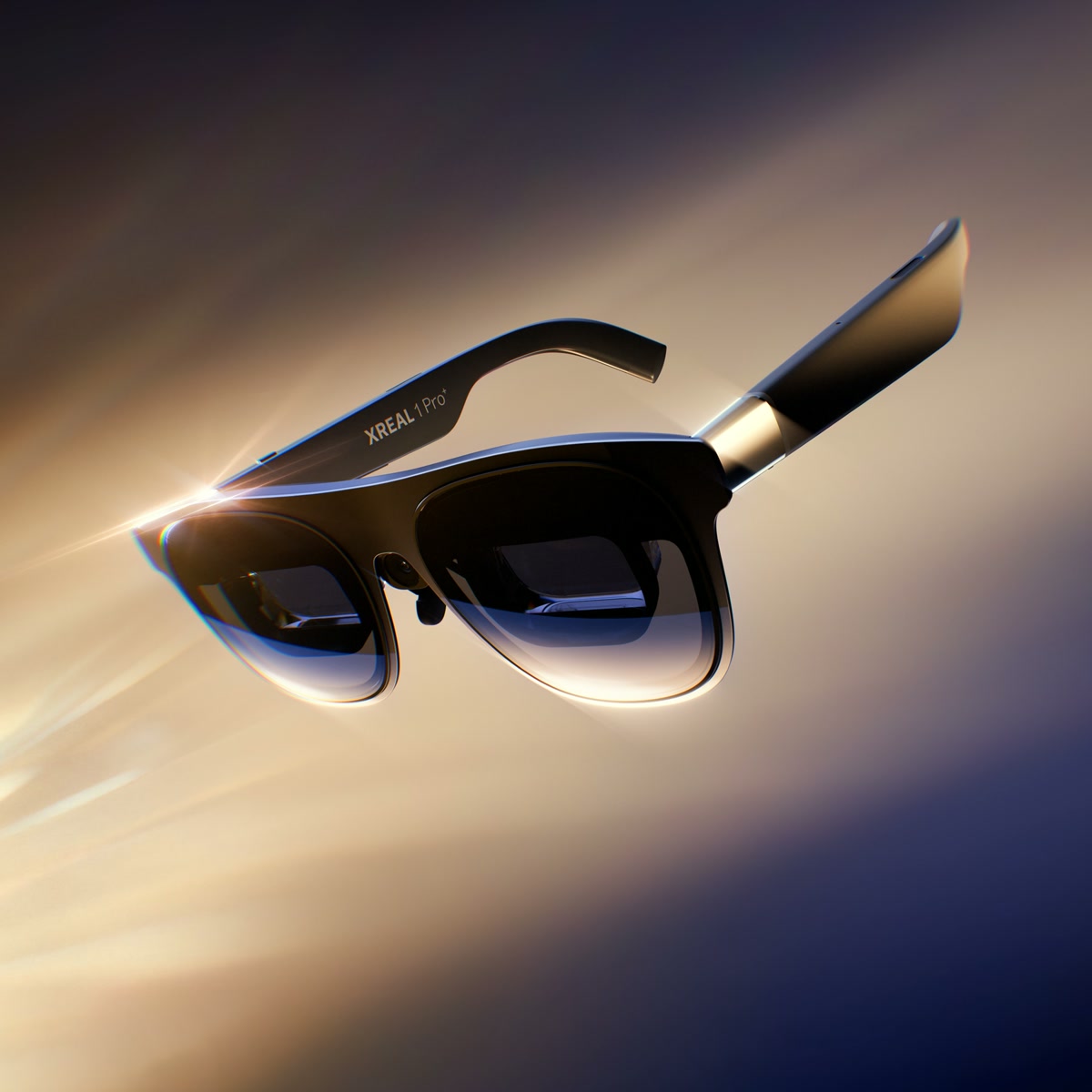 Official XREAL 1 Pro+ product image showing black display glasses with both arms open