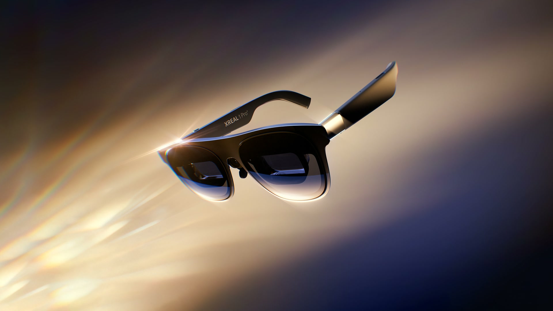 Official XREAL 1 Pro+ product image showing black display glasses with both arms open