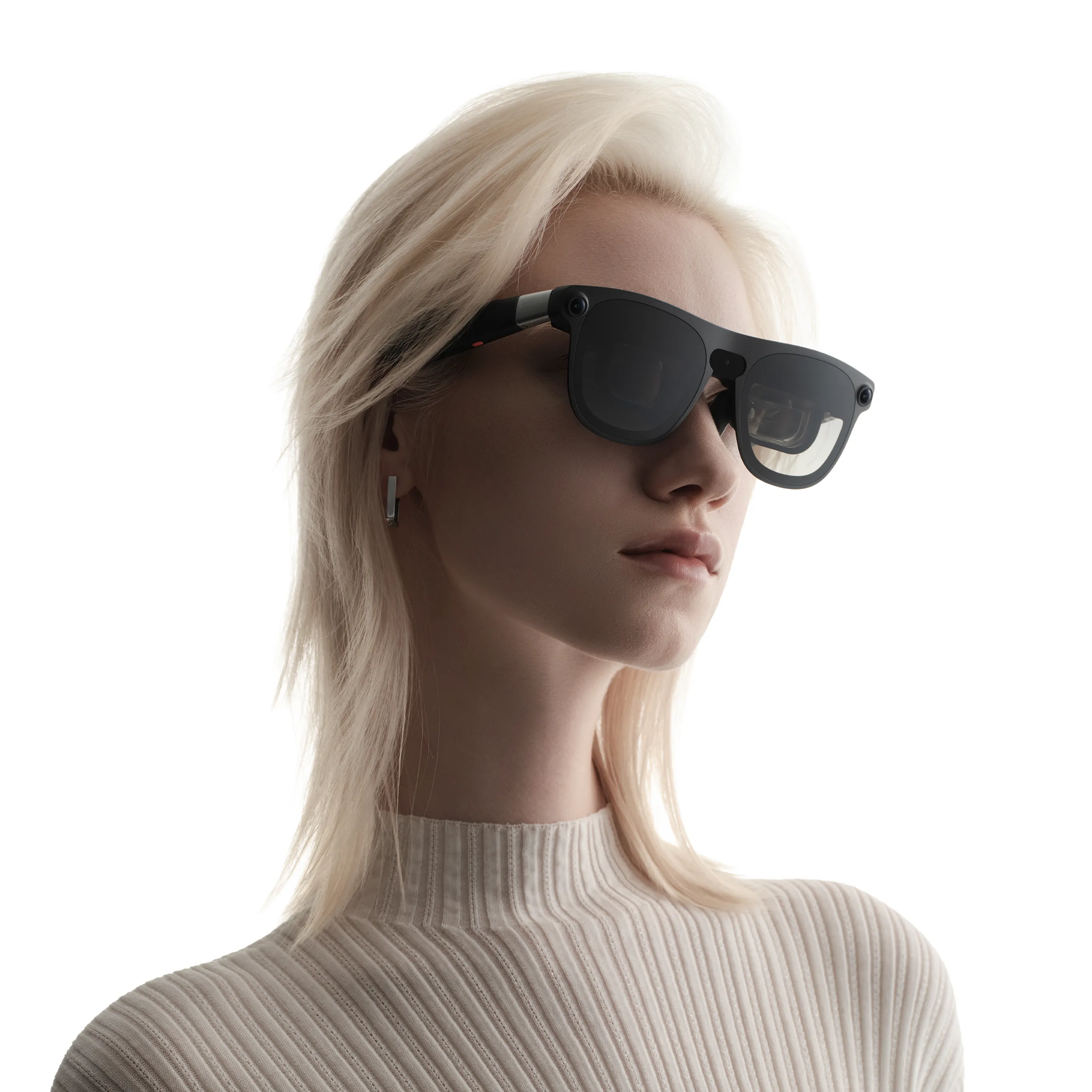 A model wearing XREAL AURA spatial computing glasses